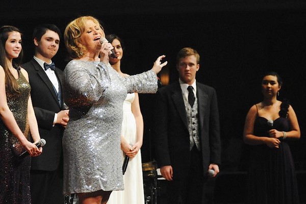 Sandi Patty performs, Kelly Muller of the Alpert Studio of Voice and Violin (background)